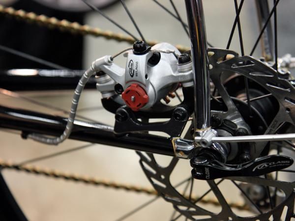 The rear brake is tucked inside the stays on Cherubim's "Rambler".