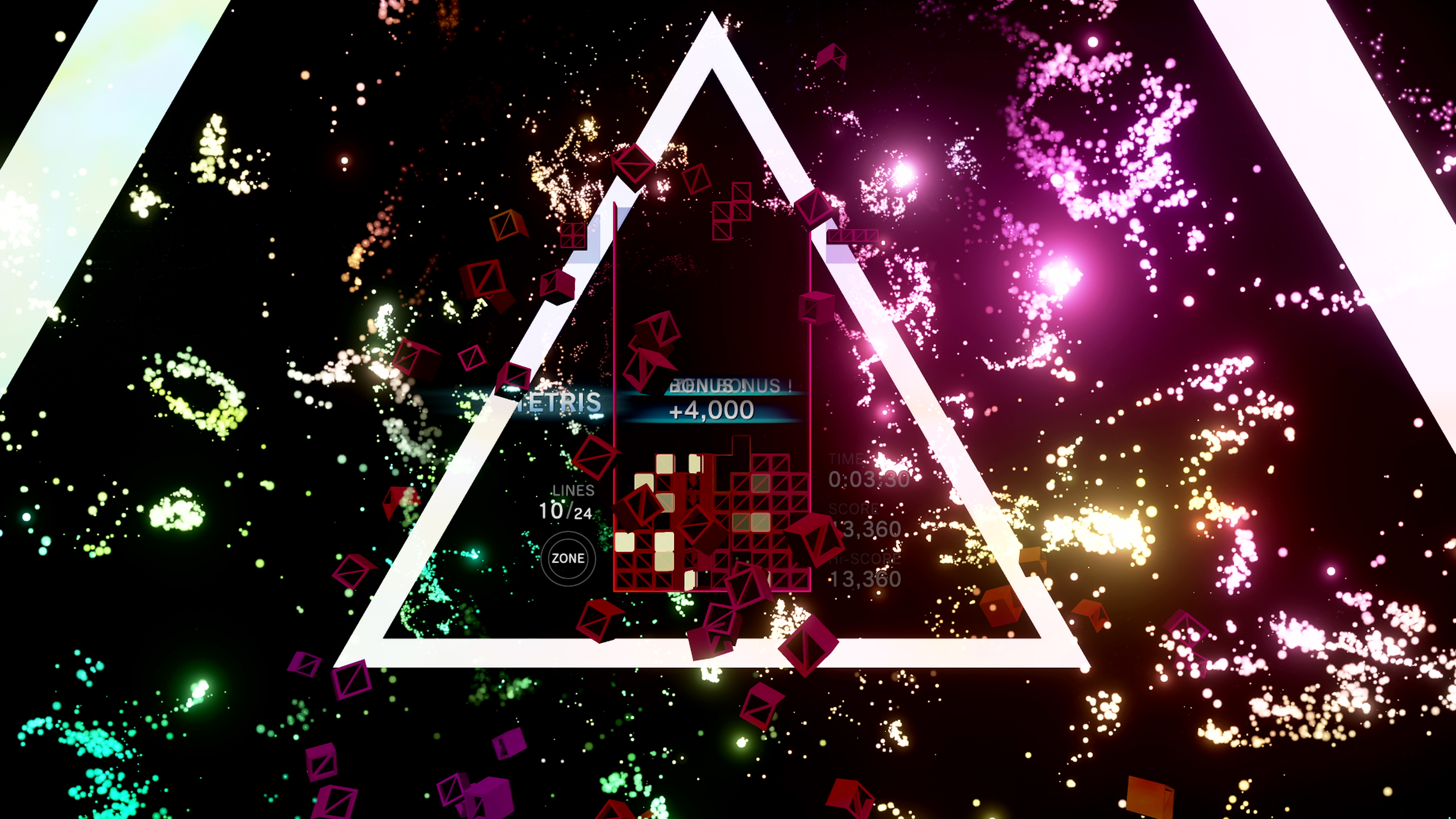 Tetris-brettet i midten, med massevis av fargesprakende effekter rundt