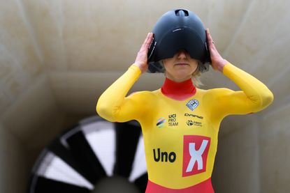 Joss Lowden in wind tunnel with Uno-X Sweet Protection Redeemer helmet