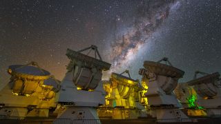 The stunning Milky Way above the antennas at the ALMA Observatory.