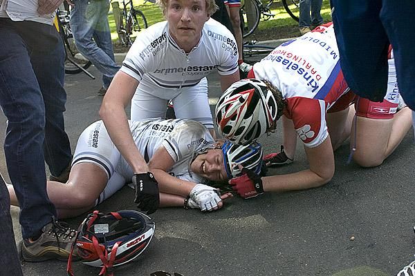 Beth Canny from Victoria is attended to after a wild crash approaching the finish to the womens' criterium.