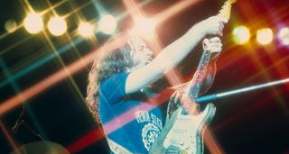 Rory Gallagher strangles his 1961 Fender Stratocaster onstage