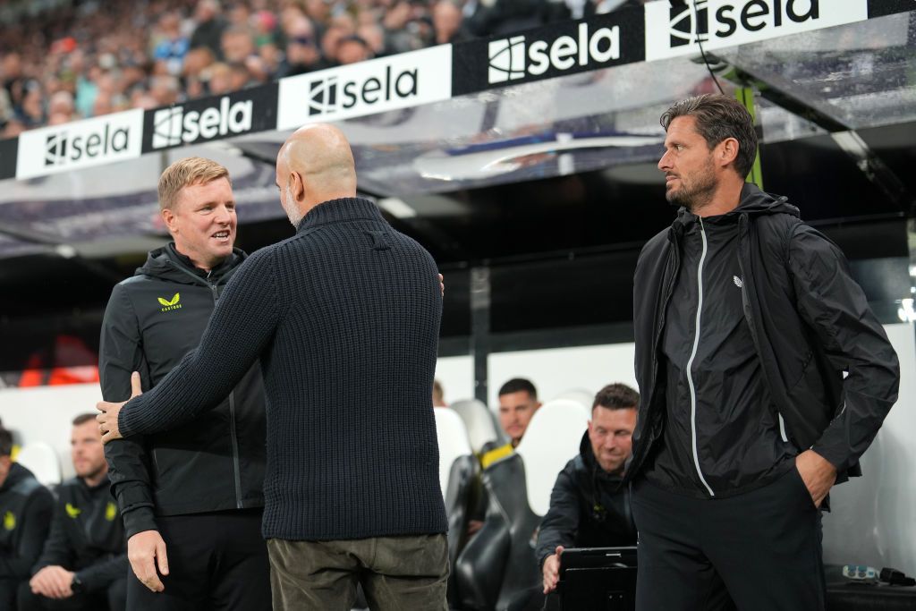 Pep Guardiola, Manager of Manchester City, speaks to Eddie Howe, Manager of Newcastle United, prior to the Carabao Cup Third Round match between Newcastle United and Manchester Cityat St James&#039; Park on September 27, 2023 in Newcastle upon Tyne, England.