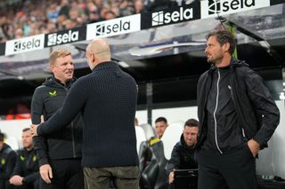 Pep Guardiola, Manager of Manchester City, speaks to Eddie Howe, Manager of Newcastle United, prior to the Carabao Cup Third Round match between Newcastle United and Manchester Cityat St James' Park on September 27, 2023 in Newcastle upon Tyne, England.