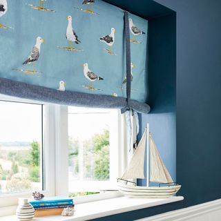 window with seagull printed blinds