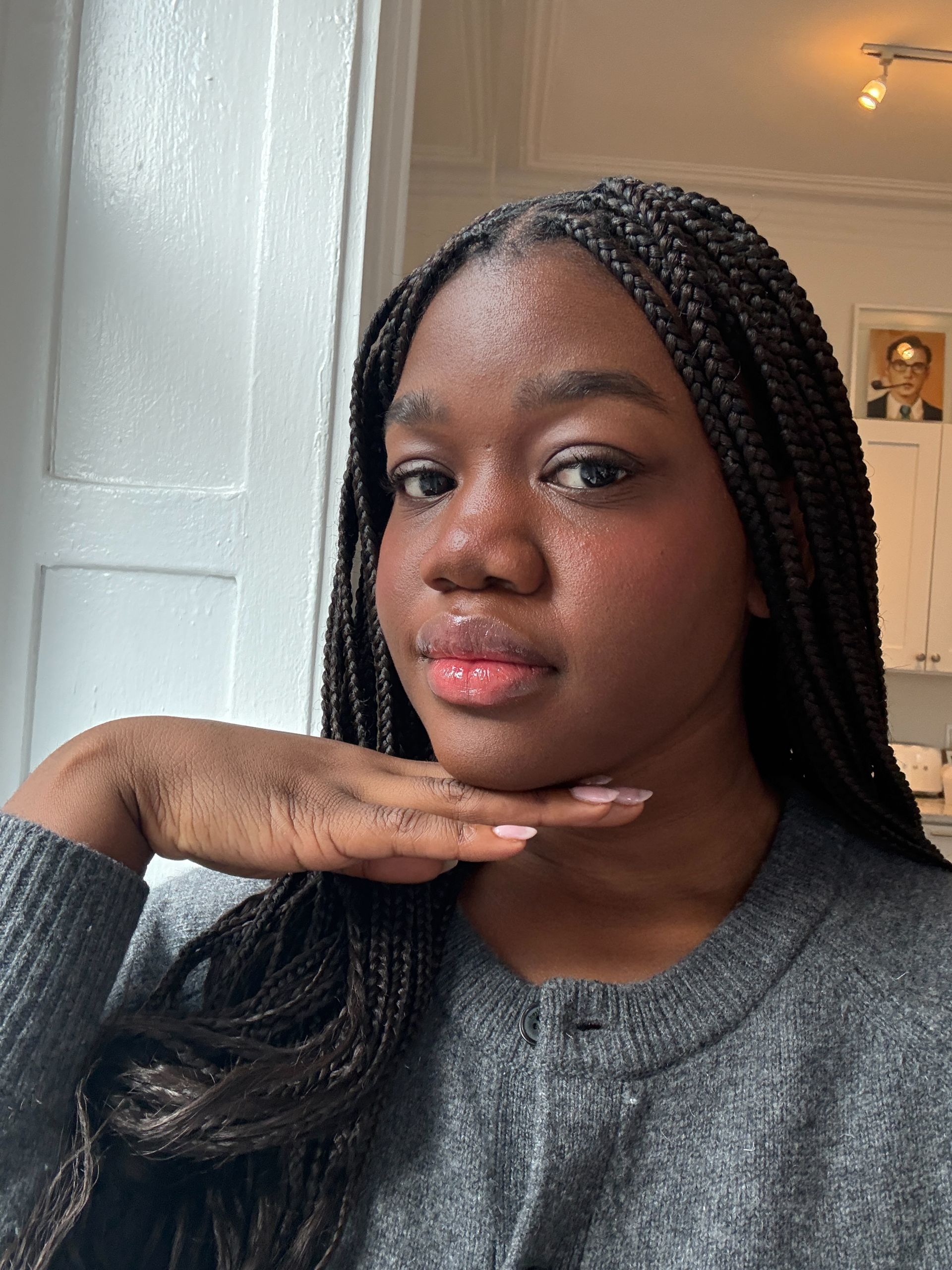 Associate Beauty Editor Maya Thomas wearing the Hourglass Unreal Liquid Blush in Imagine