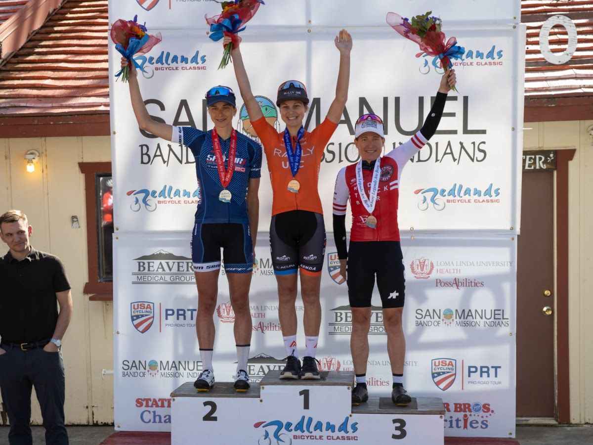 The stage podium (L-R) Emma Grant, Krista Doebel-Hickok, Amber Neben