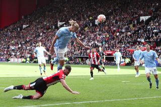 Erling Haaland of Manchester City dives to head the ball during the Premier League match between Sheffield United and Manchester City at Bramall Lane on August 27, 2023 in Sheffield, England. (Photo by Mark Leech/Offside/Offside via Getty Images)