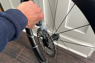 Hydraulic disc brake tips: Use a brake rotor truing tool to gently straighten slightly deformed rotors