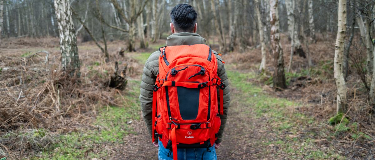 photographer wearing an f-stop Tilopa 50L DuraDiamond