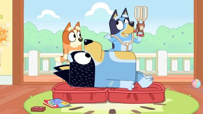 Bluey and Bingo play doctor with their dad Bandit in Bluey's TV show