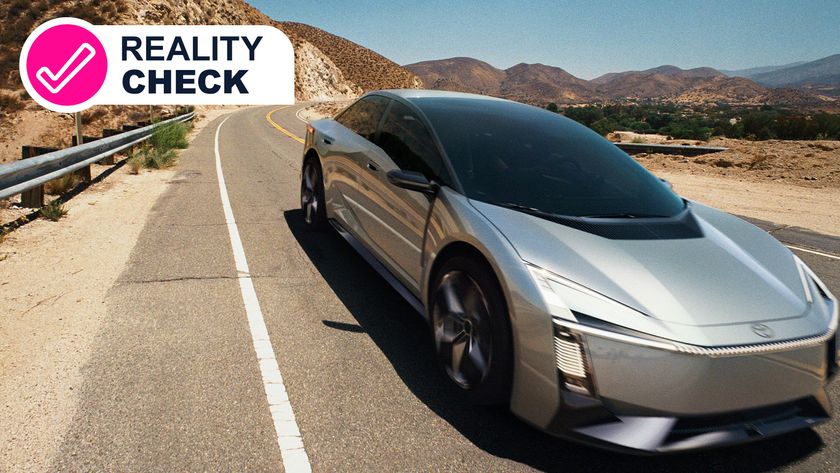 A Toyota car driving down a highway