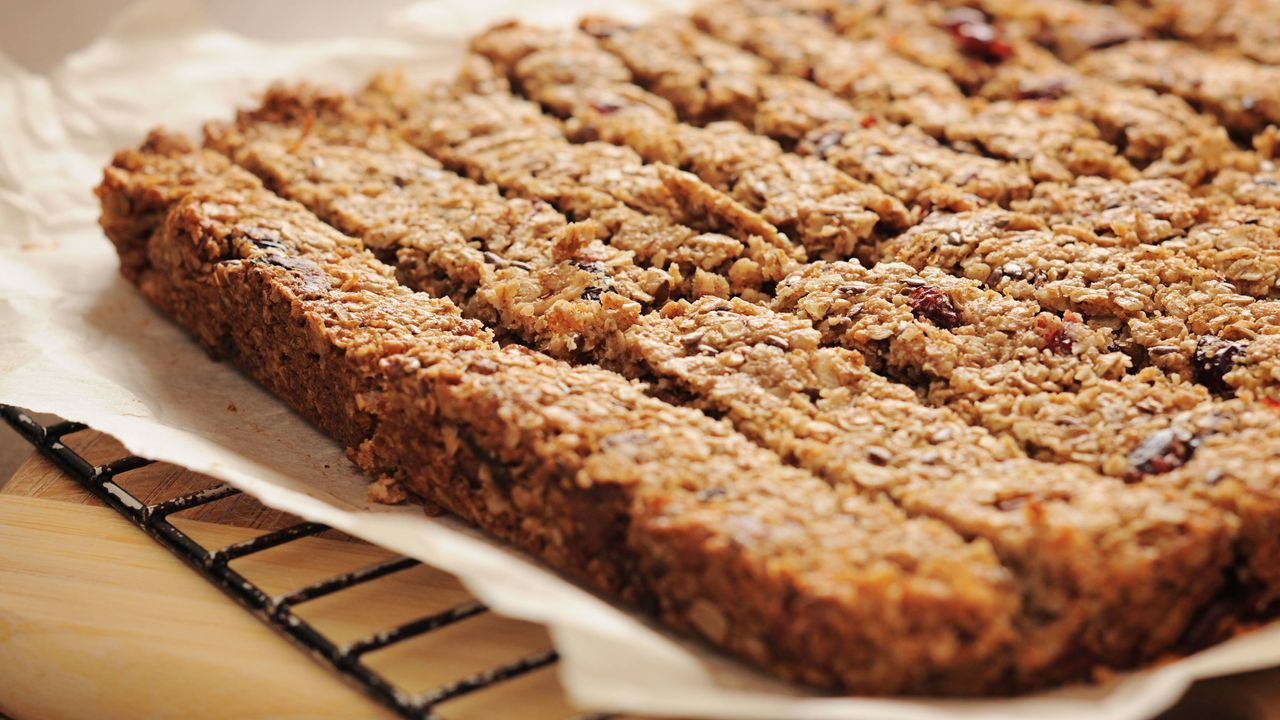 cranberry oatmeal bars cooling on a wire rack