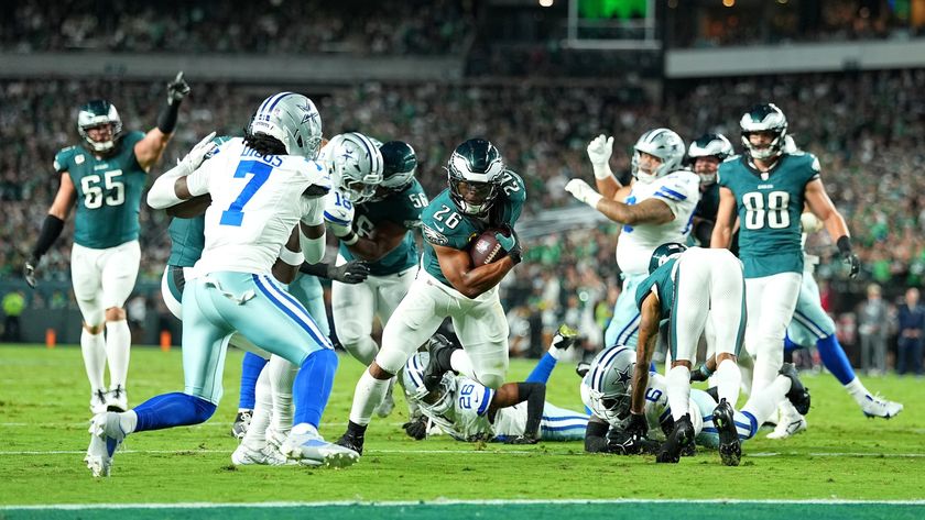 Saquon Barkley of the Philadelphia Eagles scoring a touchdown against the Dallas Cowboys