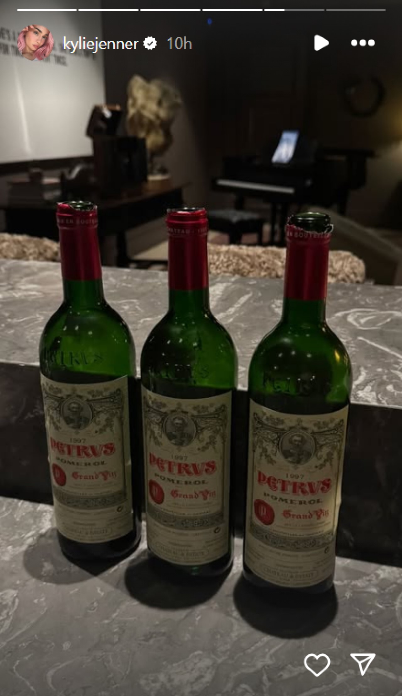 Kylie Jenner shows off bottles of wine from the year she was born on Instagram Stories.