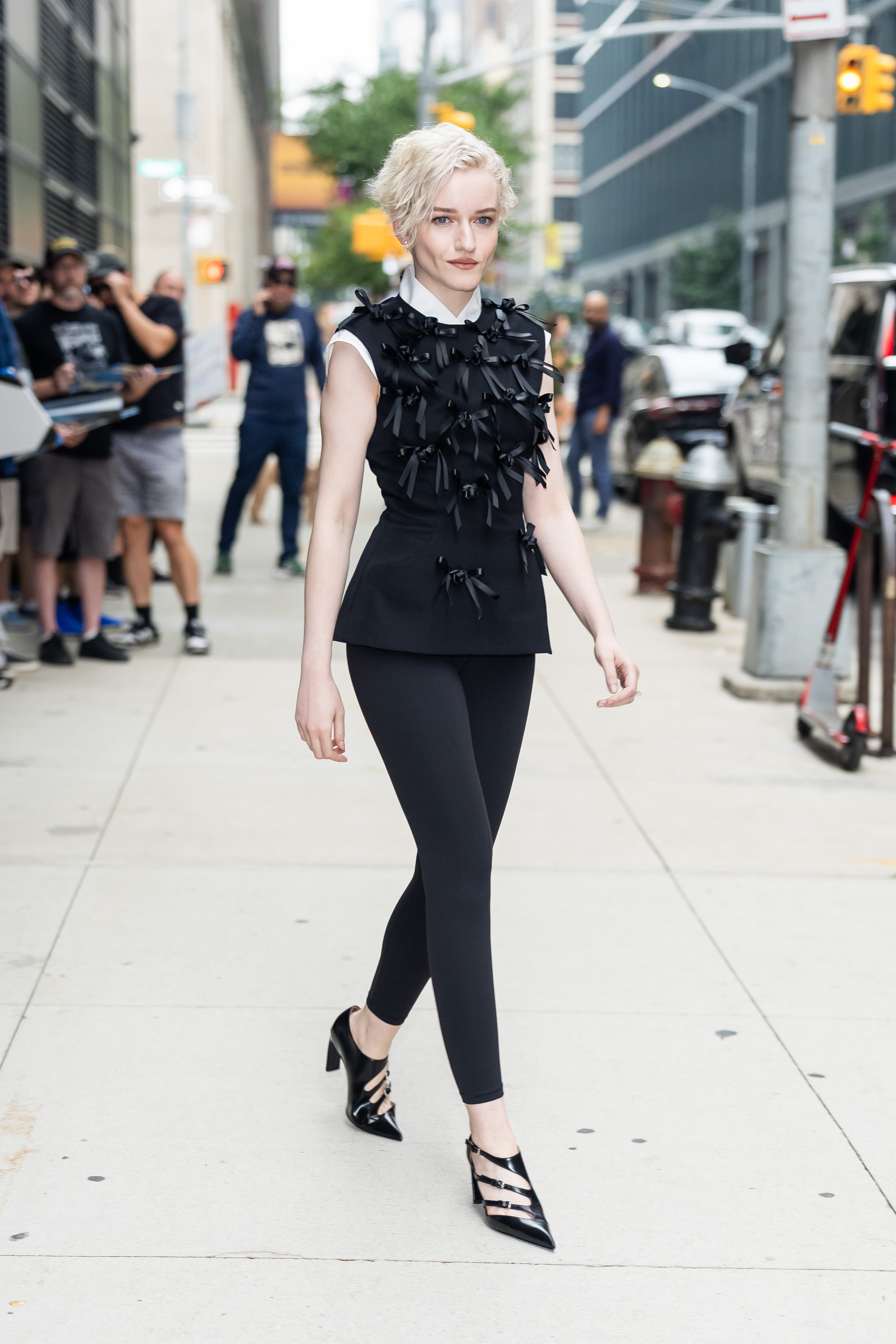 Julia Garner wears leggings with heels in NYC.