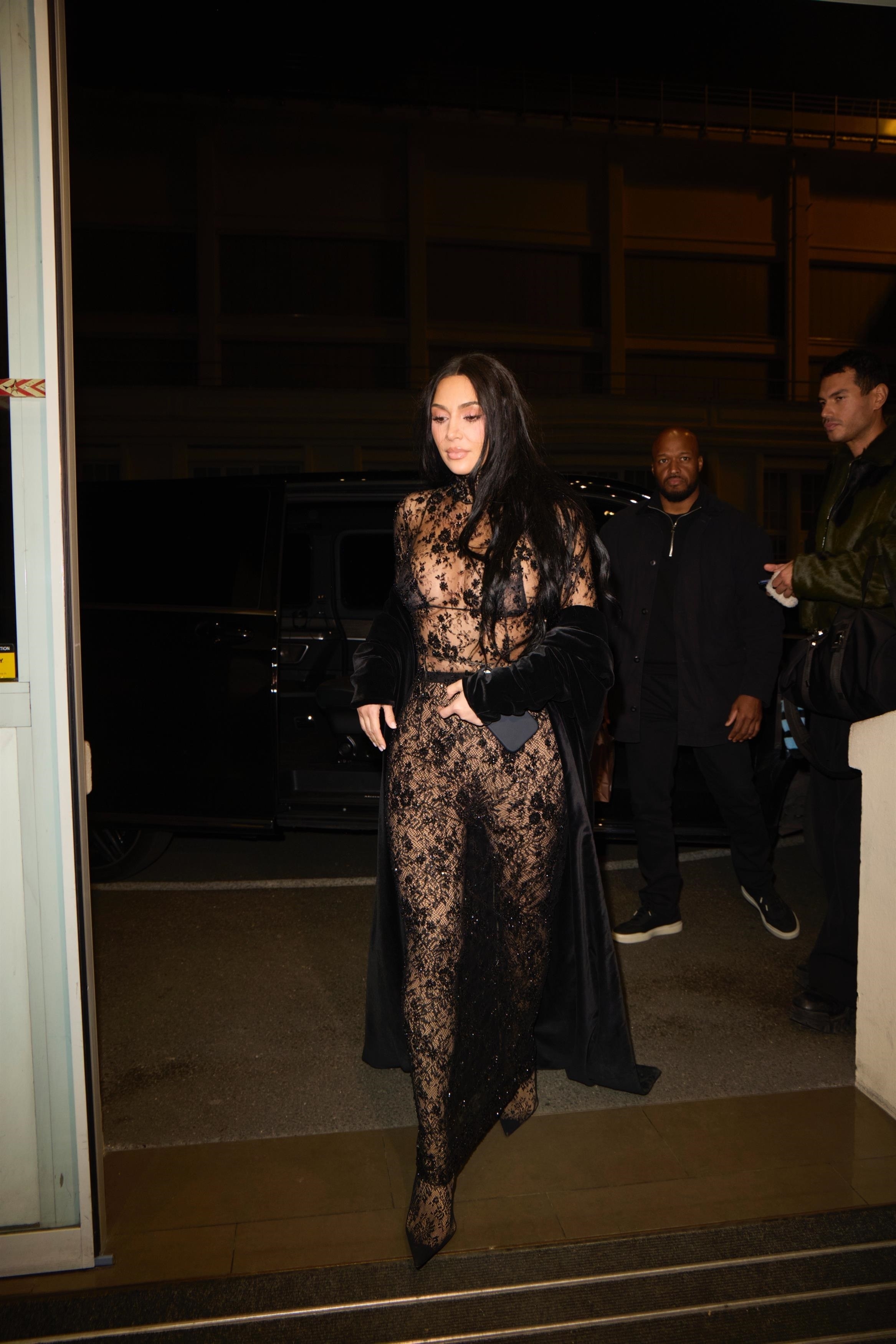 Kim Kardashian in Paris wearing a lace naked dress