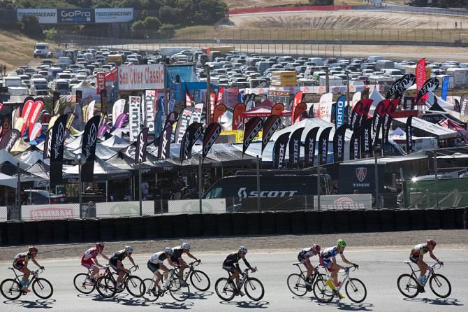The men's pro field races in front of an already-busy expo area on Thursday morning.