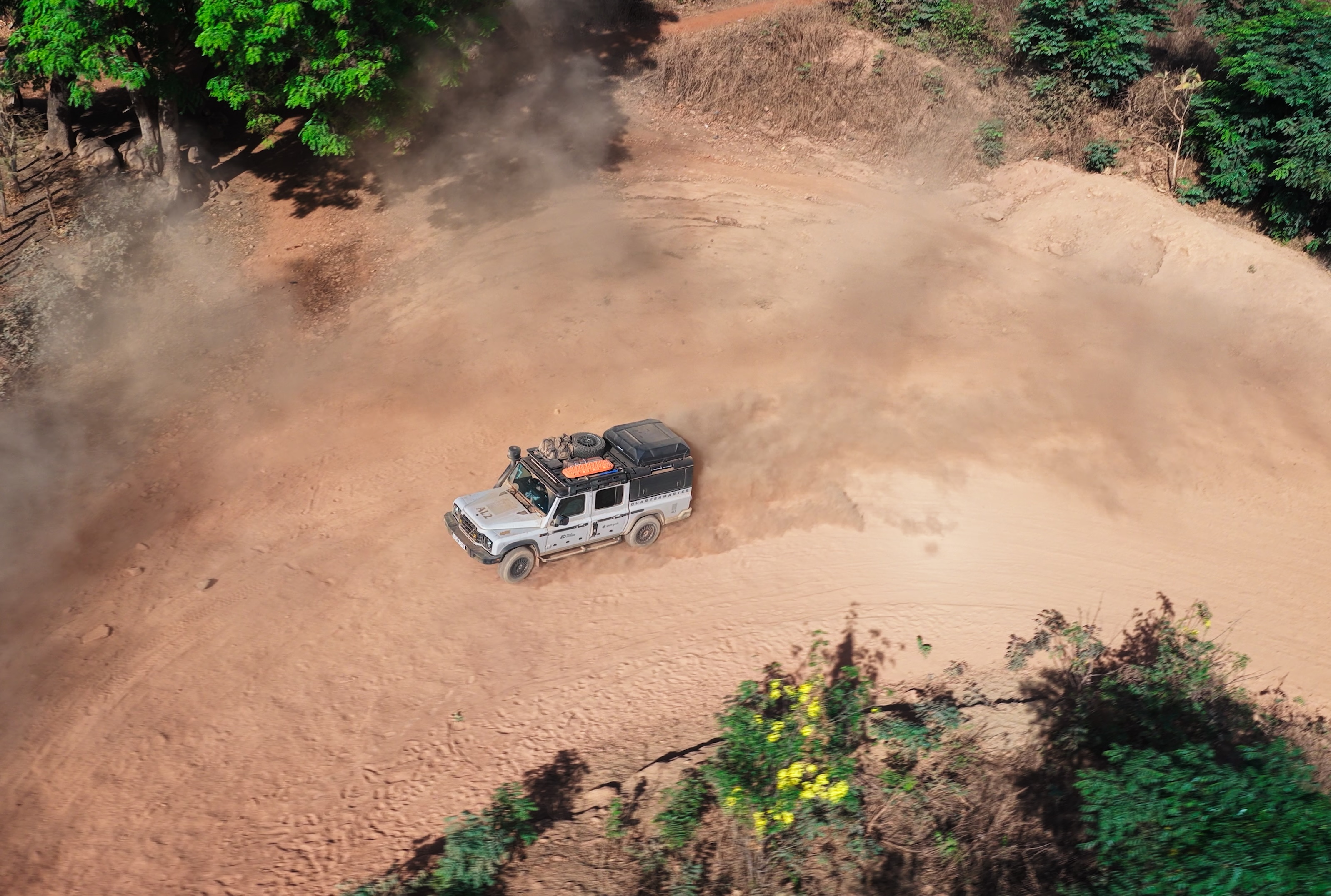 Overhead view of an Ineos Grenadier driving through Guinea