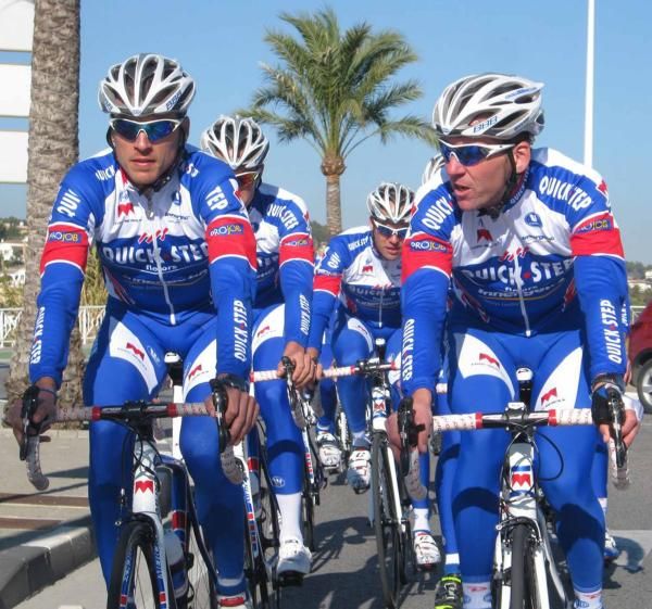The Quick Step colours are red, white and blue.