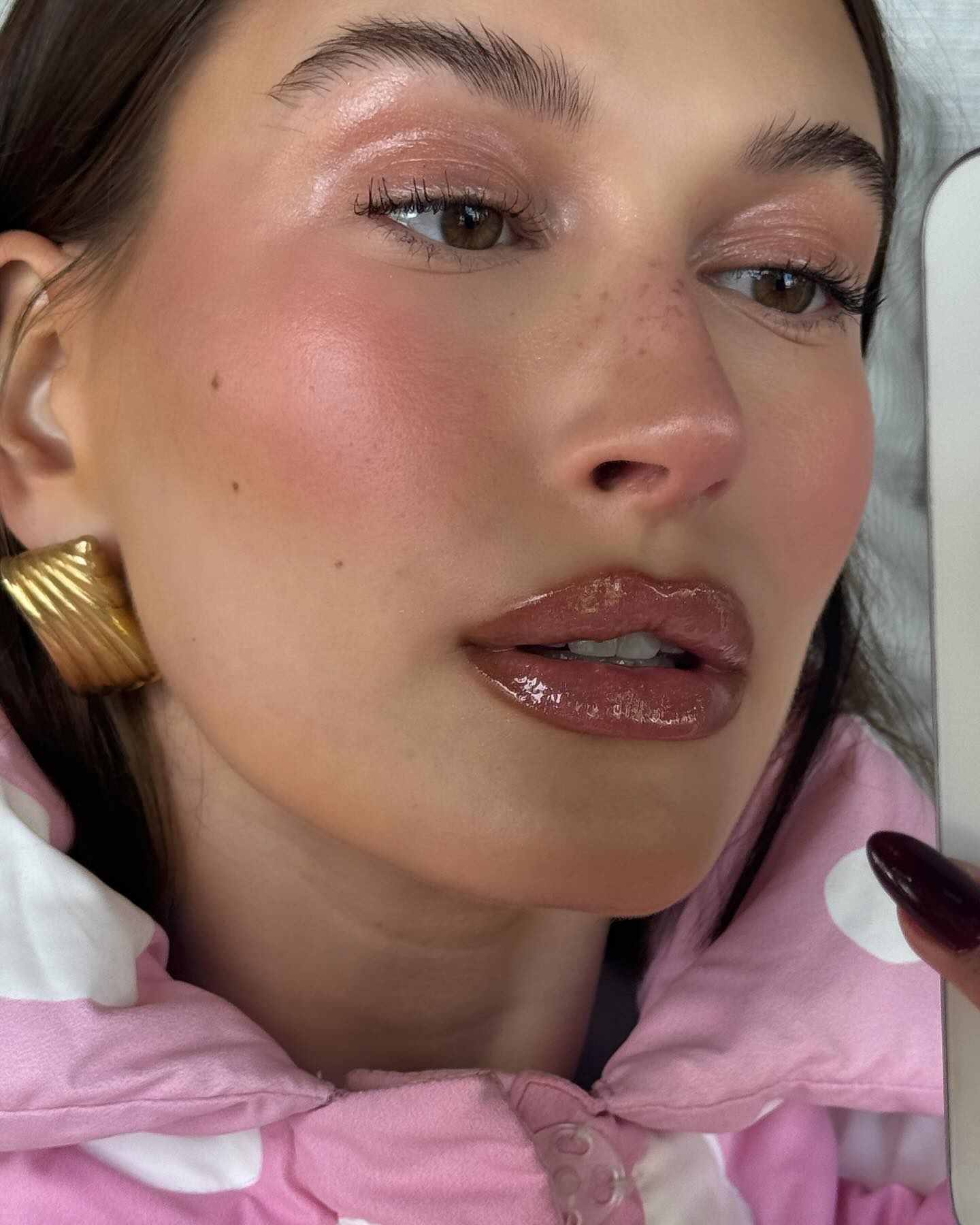 @haileybieber wearing the faux freckle makeup trend