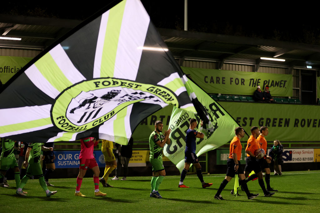 The teams and officials walk out onto the pitch prior to the Emirates FA Cup First Round Replay match between Forest Green Rovers and Scarborough Athletic at The New Lawn on November 14, 2023 in Nailsworth, England. (Photo by Michael Steele/Getty Images)