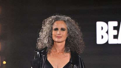 Andie MacDowell made a bold statement at Paris Fashion Week at the Eiffel Tower as she stepped out for the L'Oréal Paris Show 