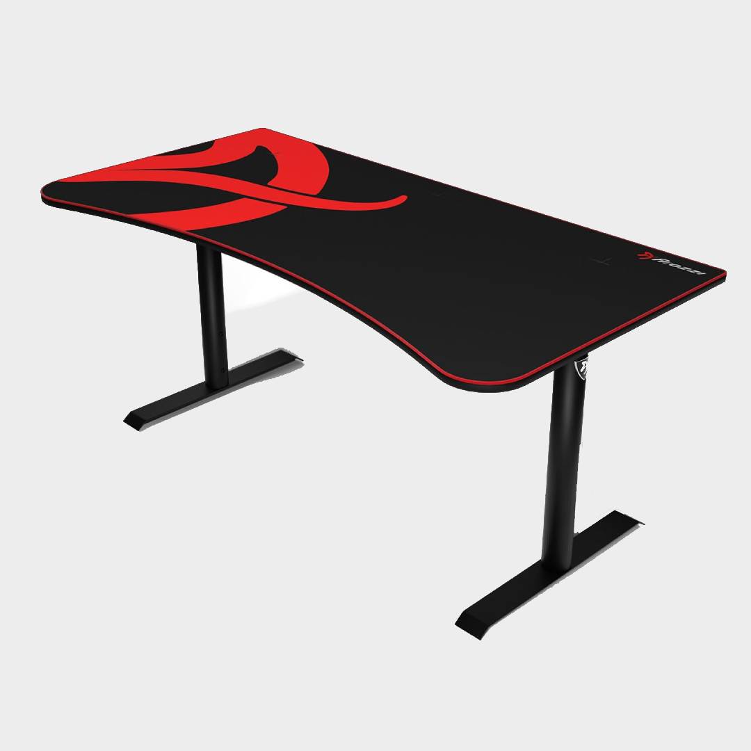 Arozzi Arena gaming desk in black and red at an angle on grey backdrop.