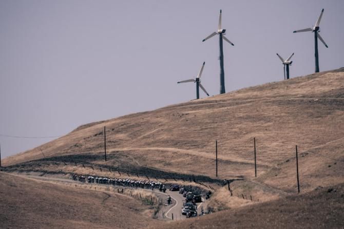 The peloton passes through the rolling hills outside of Livermore.
