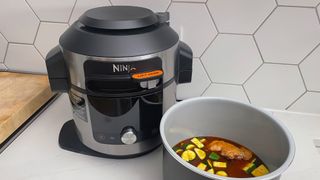 The Ninja Foodi 15-in-1 SmartLid Multi-Cooker having been used to cook a chicken curry