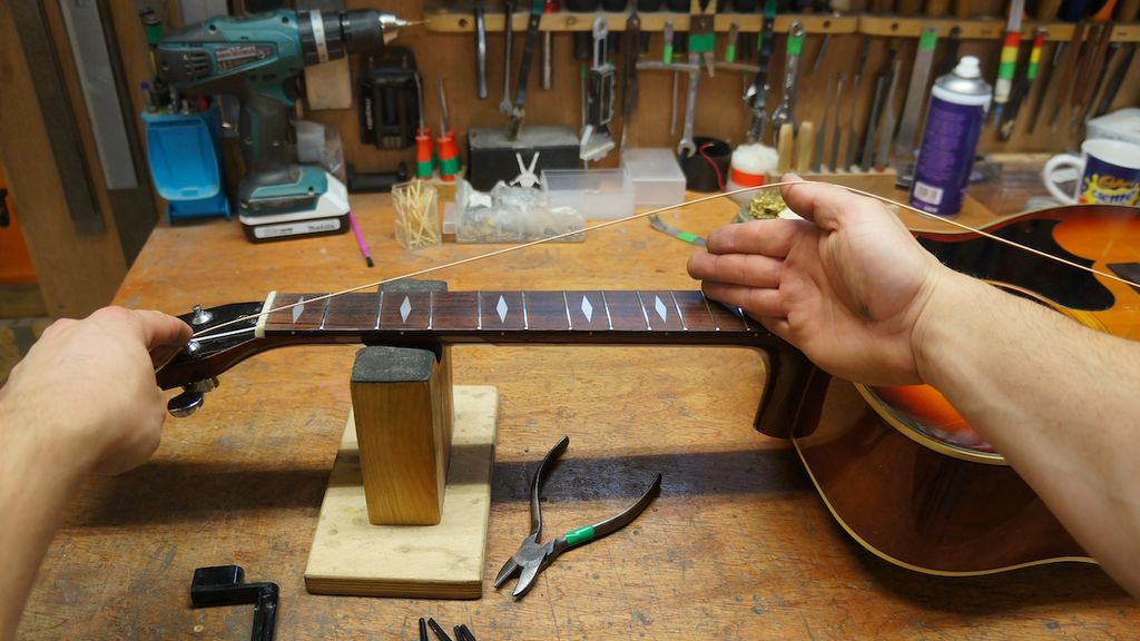 How to restring an acoustic guitar: step-by-step guidance from a