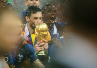 France captain Hugo Lloris kisses the World Cup trophy after Les Bleus' win over Croatia in July 2018.