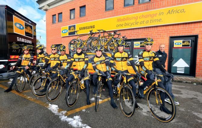 The MTN-Qhubeka team line up for a team shot before rolling out for training