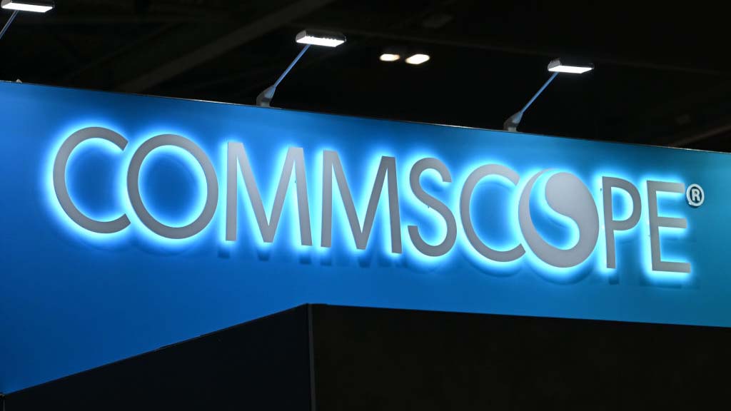 LONDON, ENGLAND - MARCH 12: The company logo for Commscope is displayed during the Tech Show at ExCel London on March 12, 2025 in London, England. Industry leaders, pioneers, and innovators gather to explore transformative solutions, gain critical insights including the latest advancements across Cloud & AI Infrastructure and connect with over 400 world-class speakers. (Photo by John Keeble/Getty Images)