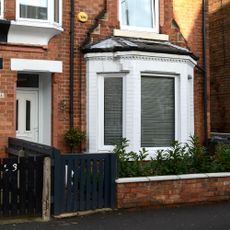 The front of a red brick town house