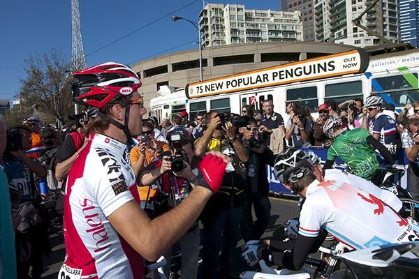 Swiss star Fabian Cancellara watches a Melbourne icon pass by...Trams are a popular mode of transport here.