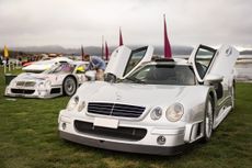 Two Mercedes Benz CLK GTRs on the competition field along Carmel Bay. Credit: Matt Jelonek via Getty