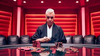 Till Lindemann playing poker in a kimono