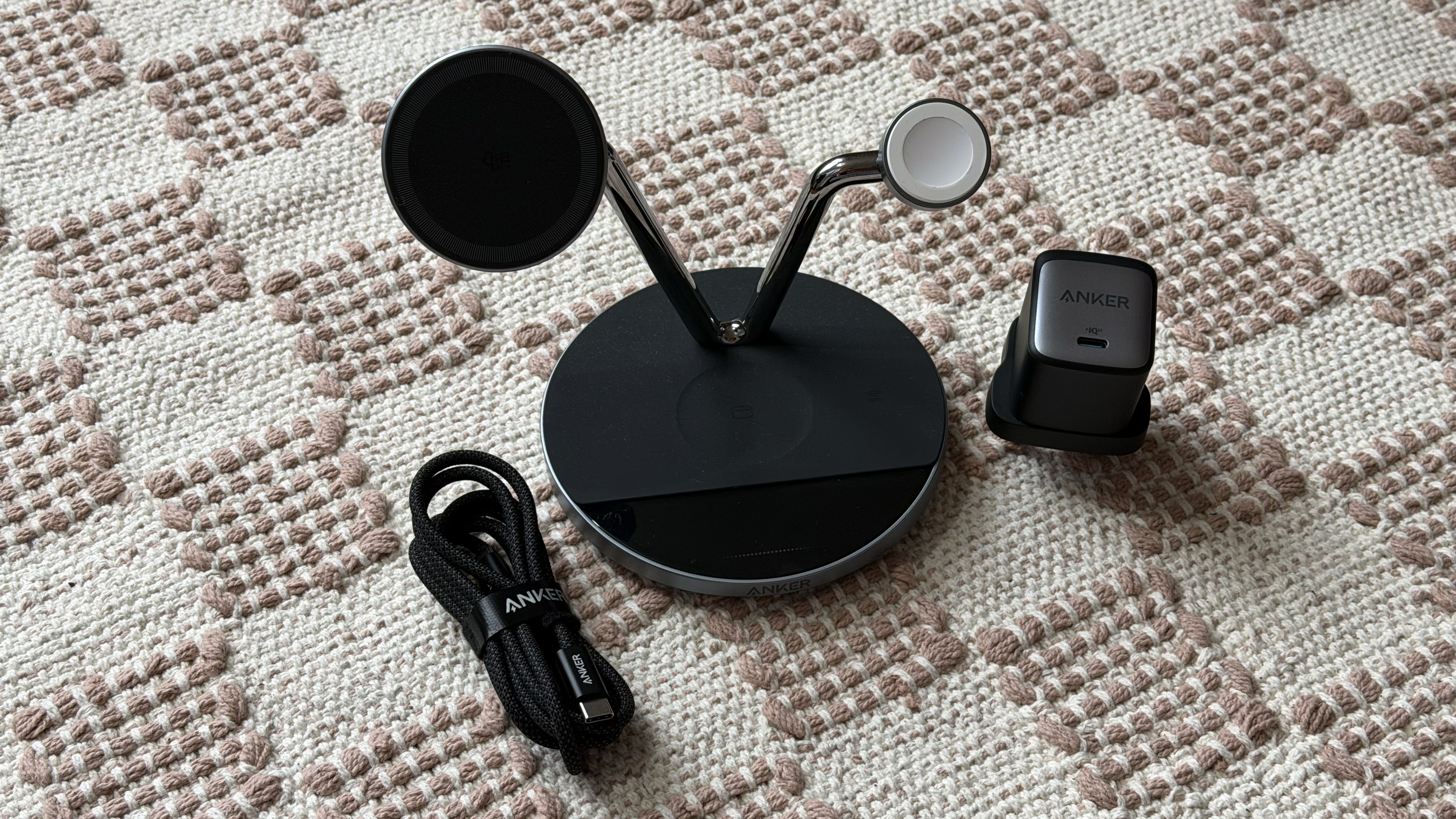 Anker Prime Wireless Charging Station with its included power brick and USB-C cable