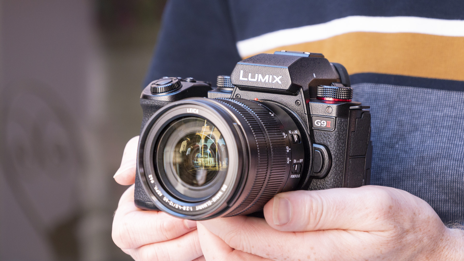 Panasonic Lumix G9 II camera in the hand