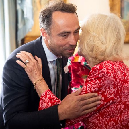 James Middleton hugging Queen Camilla