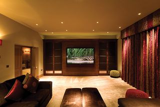 Brilliant have included a plasma TV and discreet custom made soundbar in this room