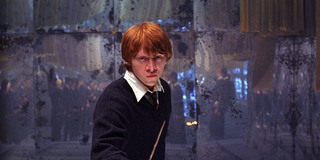 Rupert Grint as Ron with his wand in the DA