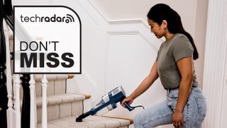 Student using Shark Stratos Corded Stick vacuum on the stairs