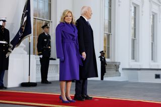 Jill Biden and Joe Biden stand outside the White House on the second Inauguration Day of President Trump