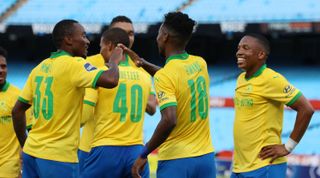 Themba Zwane celebrates his goal with teammates