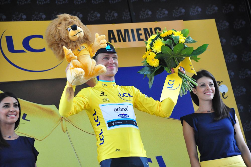 Tony Martin in yellow on the stage 5 podium.