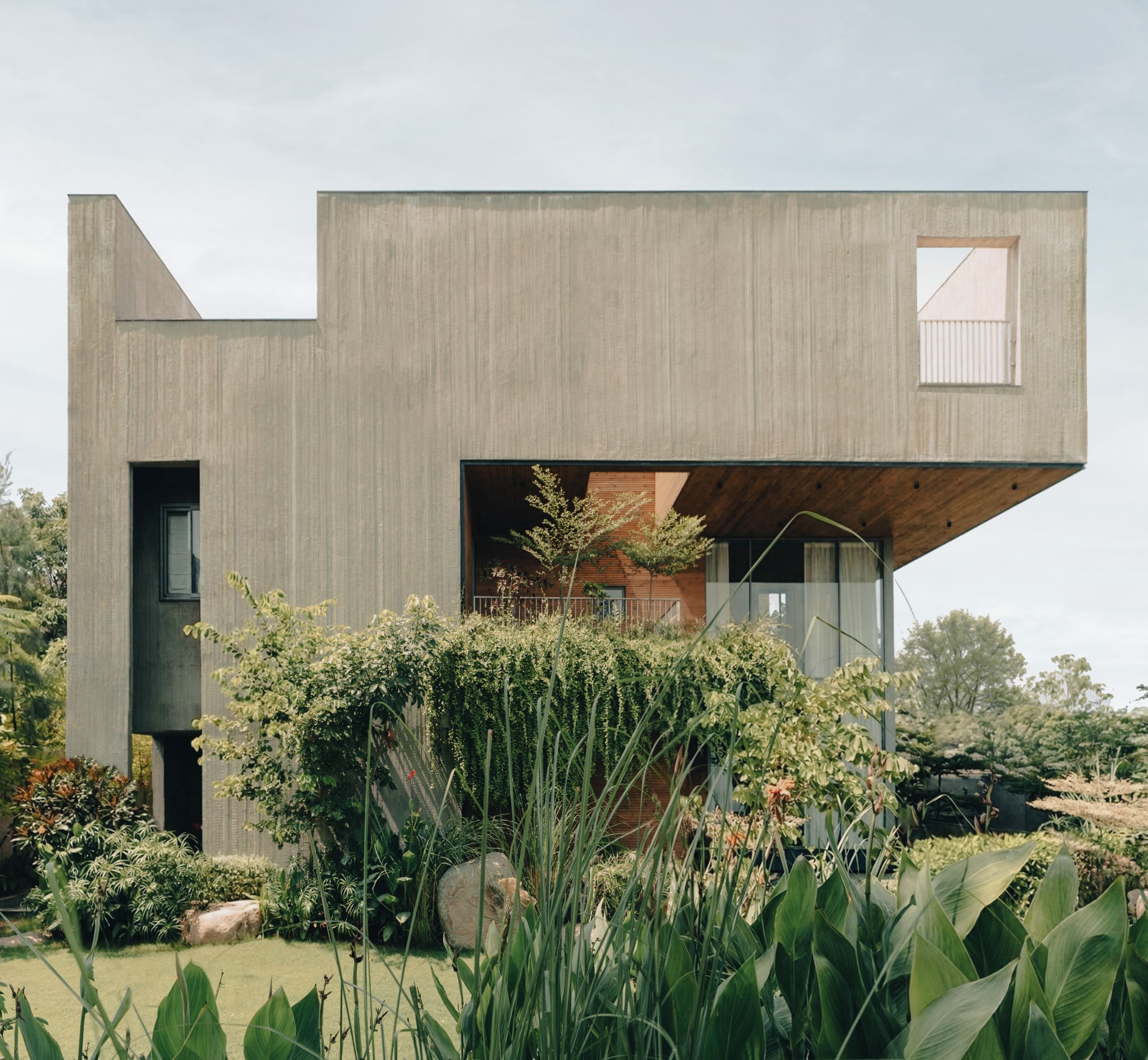 wallpaper.com - Jonathan Bell - It's into the voids as a monolithic Ahmedabad home carves out space for the outdoors