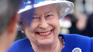 BALMORAL, UNITED KINGDOM - AUGUST 07: Queen Elizabeth II attends a Garden Party at Balmoral Castle, on August 07, 2012 in Aberdeenshire, Scotland.