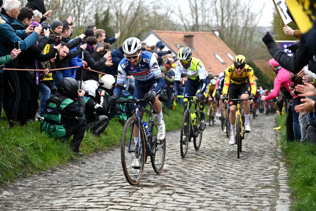 OUDENAARDE BELGIUM APRIL 02 Julian Alaphilippe of France and Team Soudal QuickStep competes passing through a Molenberg cobblestones sector during the 107th Ronde van Vlaanderen Tour des Flandres 2023 Mens Elite a 2734km one day race from Brugge to Oudenaarde UCIWT on April 02 2023 in Brugge Belgium Photo by Tim de WaeleGetty Images